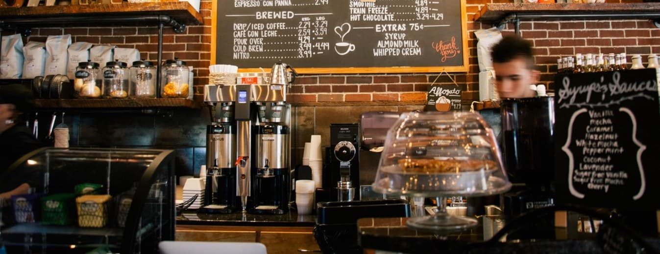 Exposed-brick espresso bar counter